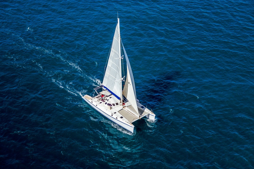 Explore the world of catamarans, offering stability, speed, and luxurious space.