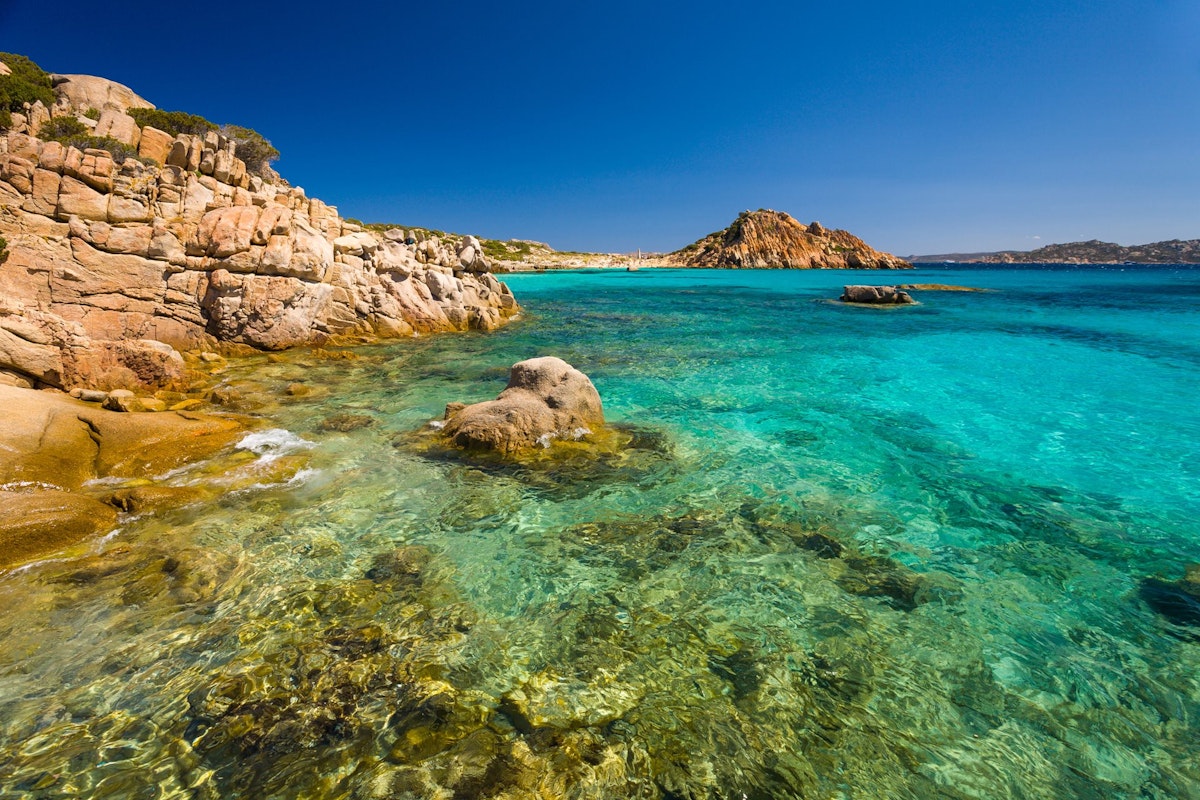 Northern Sardinia will engulf you with beautiful beaches, mysterious islands, ancient forts, and navigational adventures.