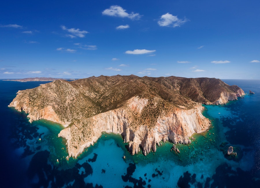 The sight of Polyaigos Island is breathtaking, with its magnificent cliffs towering over the sea.