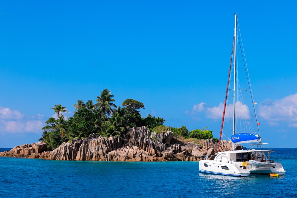 Saint Pierre Island, Seychelles with catamaran nearby