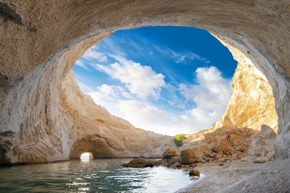 The sight of the exposed volcanic cave of Sykia on Milos Island.