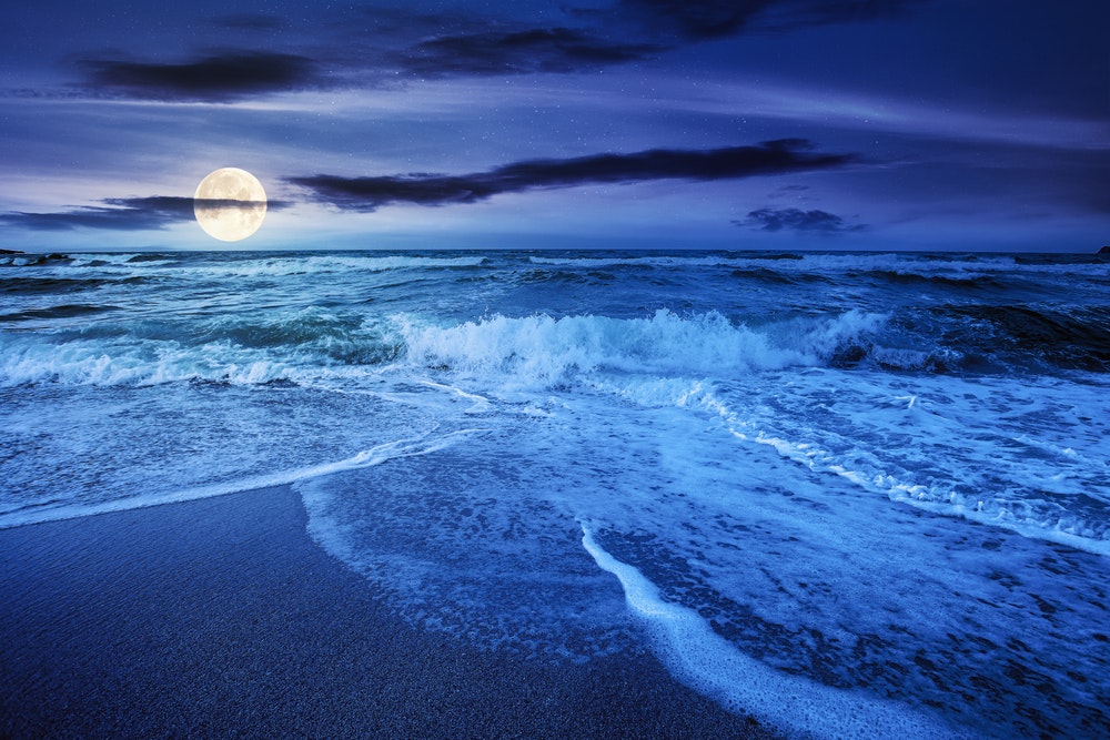 Sea tide in full moon light