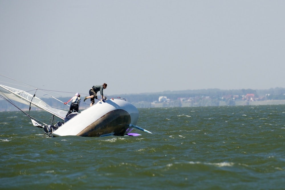 Yacht capsized in strong winds